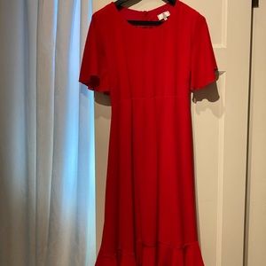 Red maternity dress with cape and flounce details!